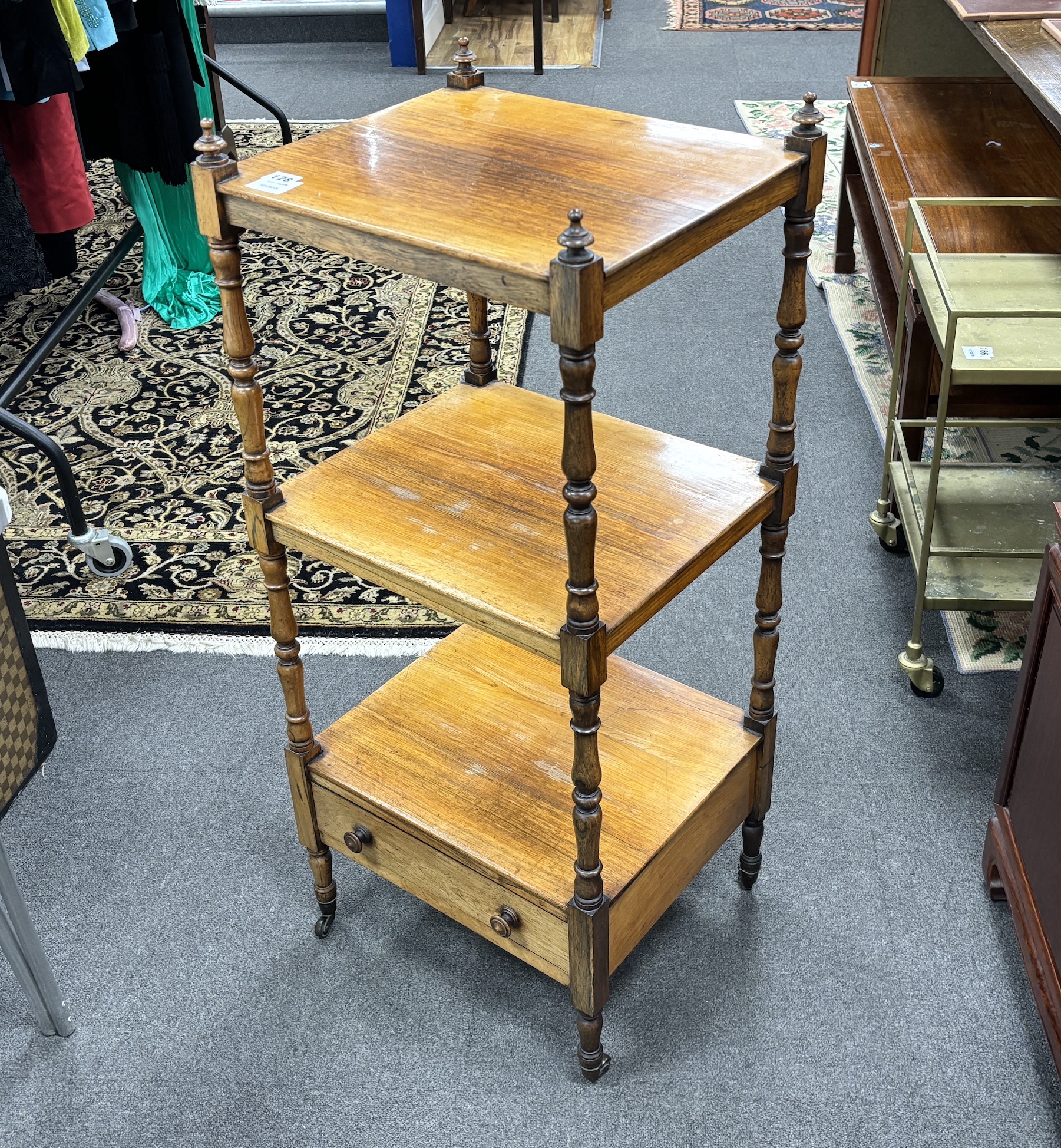 A Victorian rosewood three tier whatnot, width 43cm, depth 38cm, height 101cm